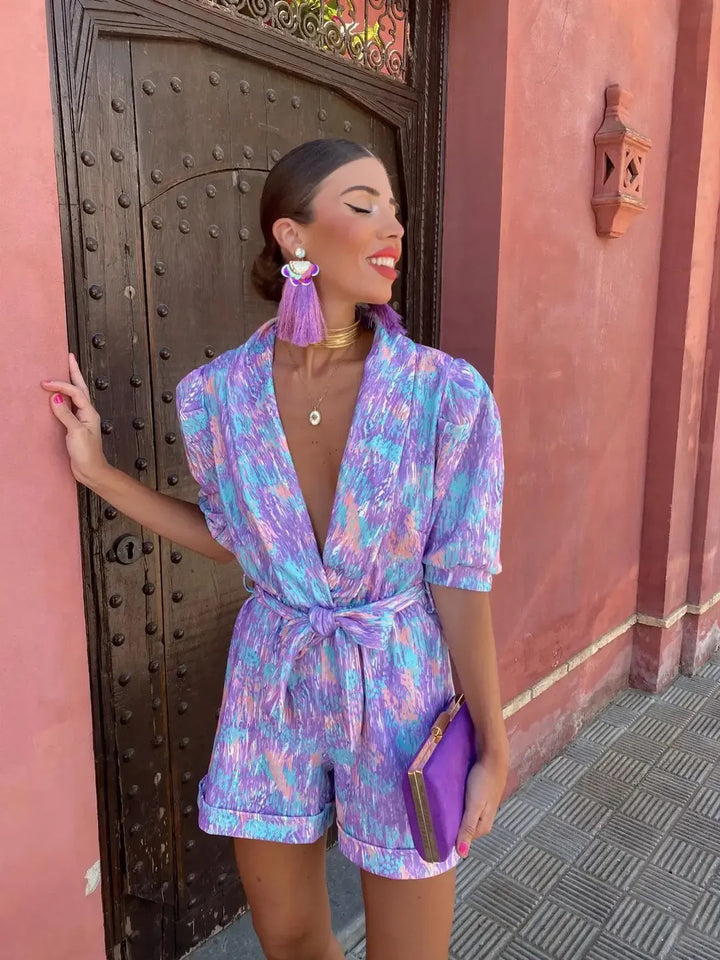 Luna’s Electric Bloom Belted Print Jumpsuit