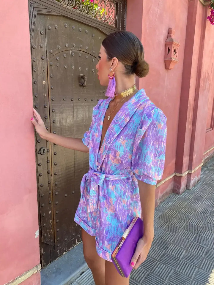 Luna’s Electric Bloom Belted Print Jumpsuit