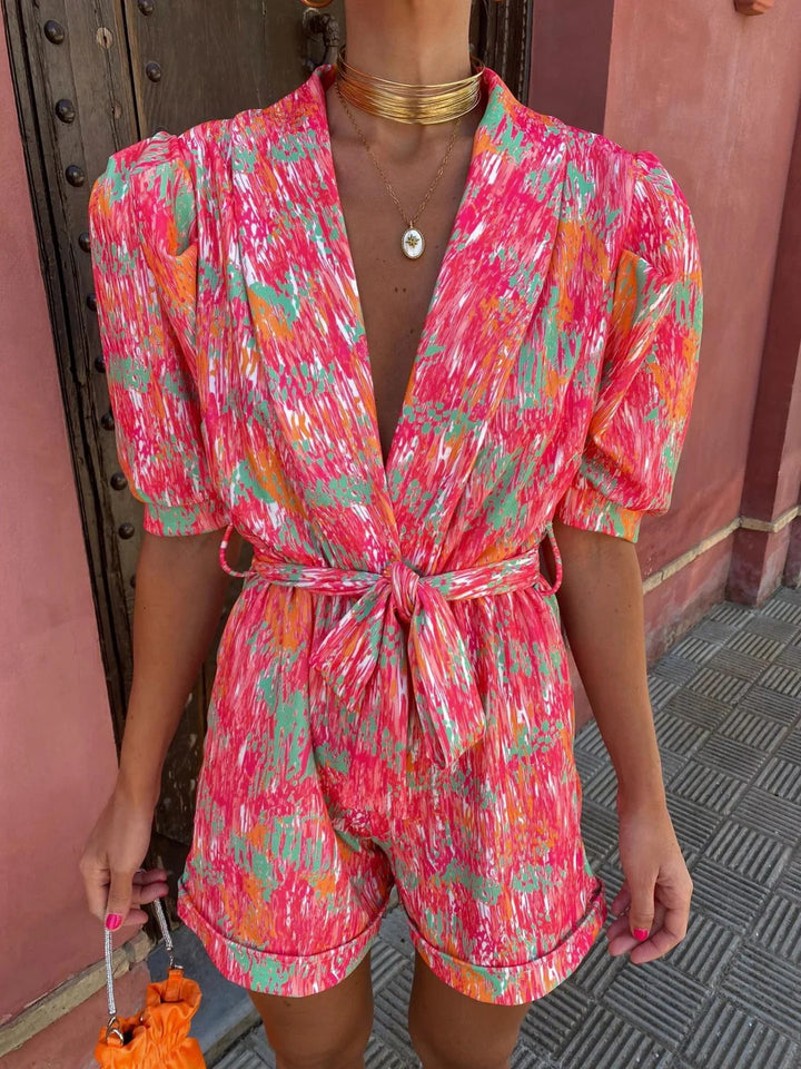 Luna’s Electric Bloom Belted Print Jumpsuit