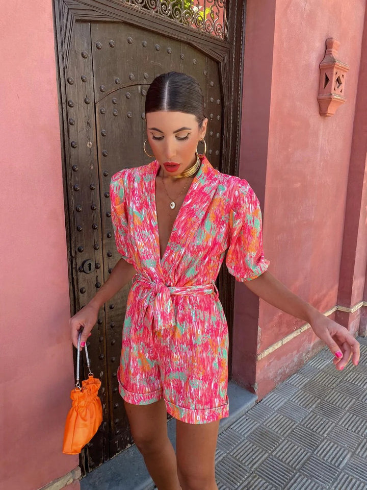Luna’s Electric Bloom Belted Print Jumpsuit