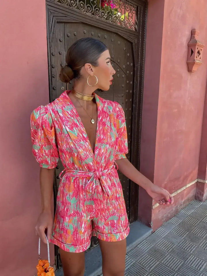 Luna’s Electric Bloom Belted Print Jumpsuit
