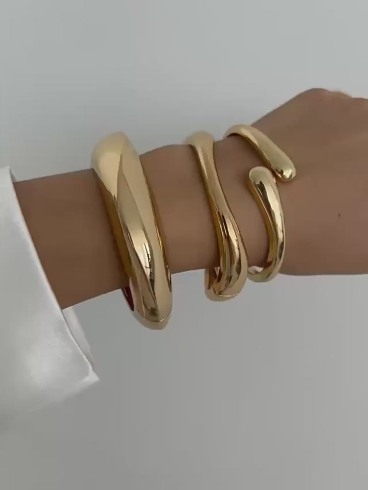 Luna’s Elegant Fluid Cuff Bracelet